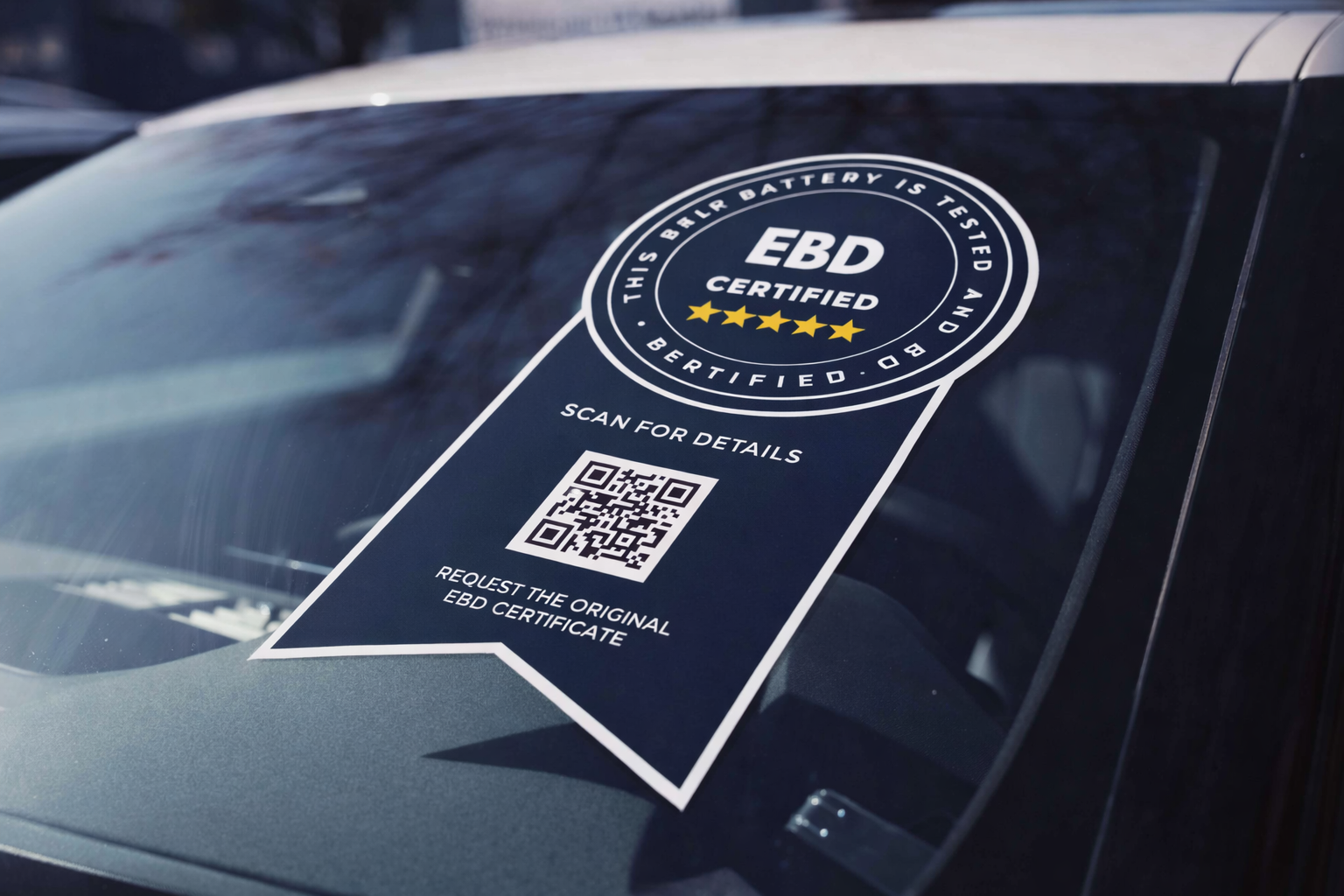 EBD Certified seal displayed on vehicle window with QR code
